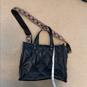 Elegant Black Quilted Tote with Patterned Strap